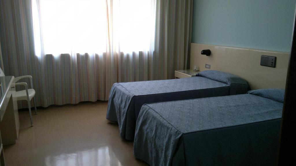 Albergo Casa Dell'Ospite Brescia Ruang foto